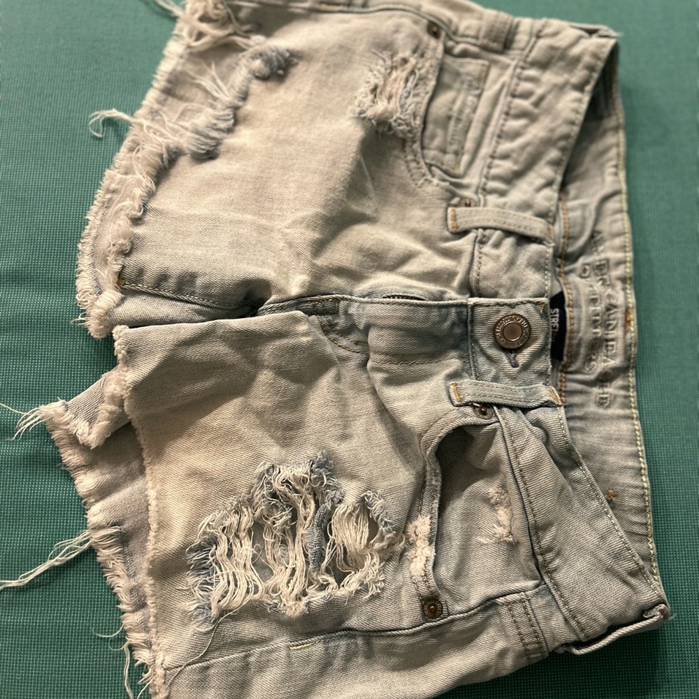 Distressed Light Blue Denim Shorts